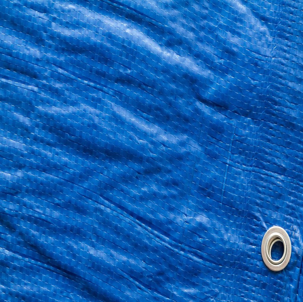 A close up image of Tarpaulin Protective Sheeting.